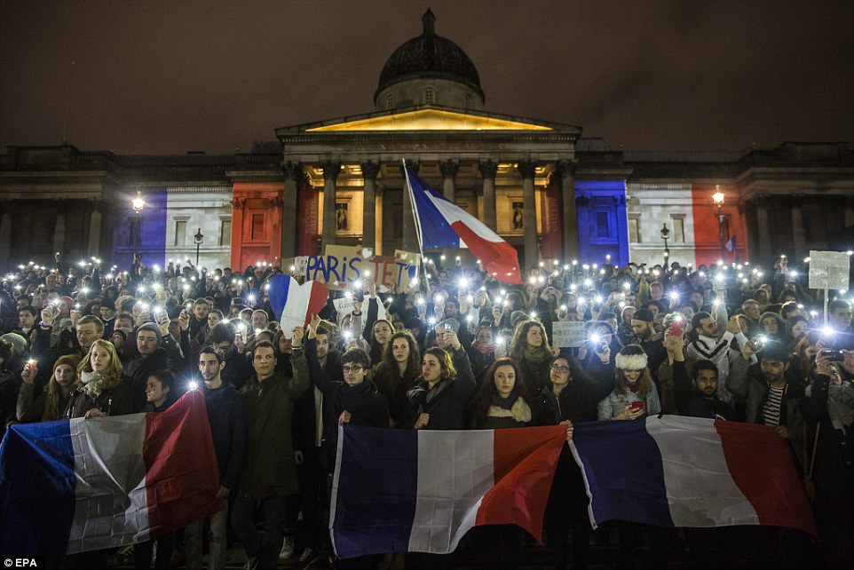 2E72E42B00000578-3319244-French_flag_Hundreds_of_people_attend_a_vigil_for_the_victims_of-a-6_1447603530455